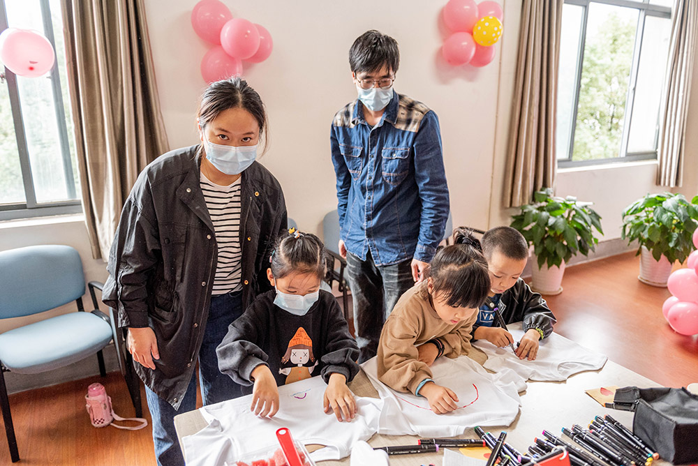 A Family Day at a 'WeCare' factory in China enables workers to bond with their children